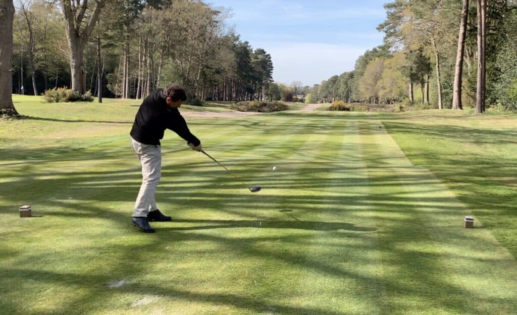 Golfer hitting a driver